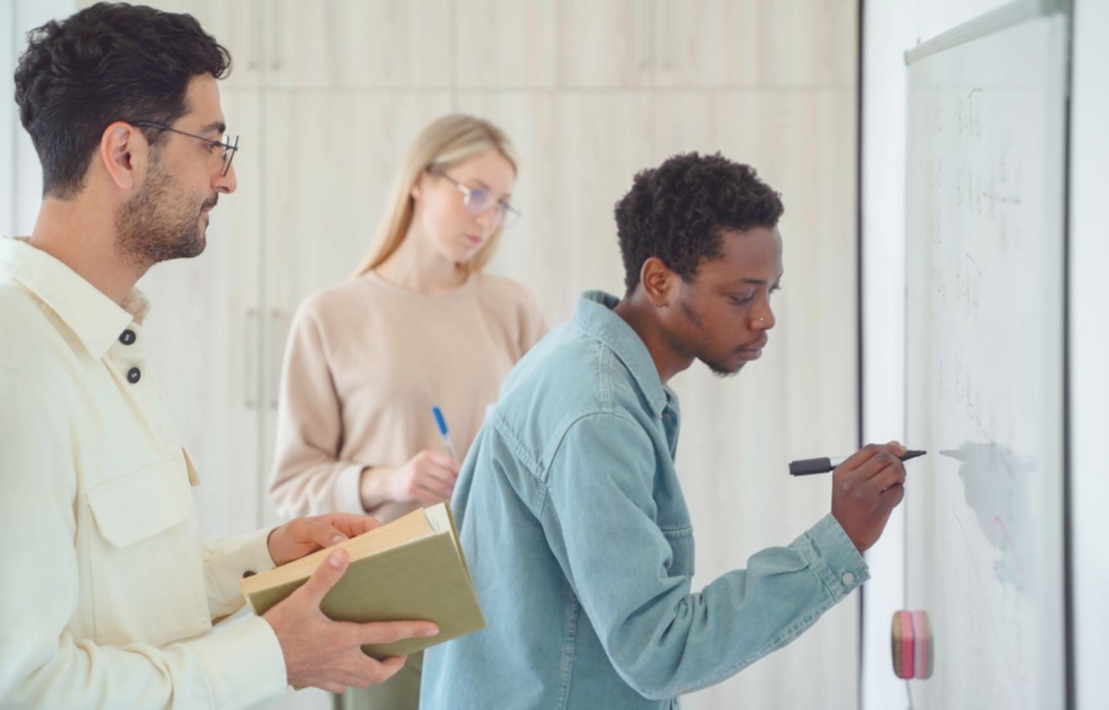 Person reviewing financial documents and planning budget strategies